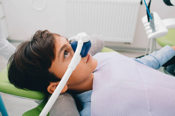 a little boy going under sedation